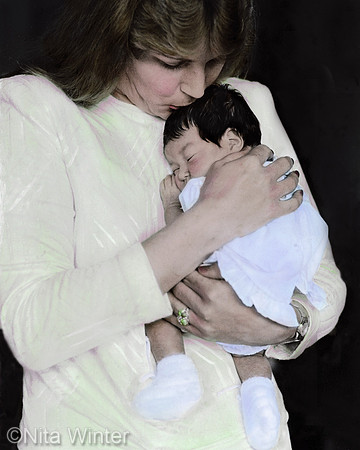 Caucasian mother in Yellow Dress Kissing Newborn_NW1BB
