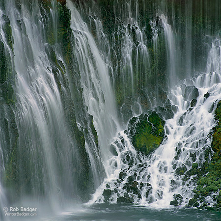Water cascading over rocks and section of  moss covered waterfall_McArthur Burney Falls State Park_California_Rob Badger