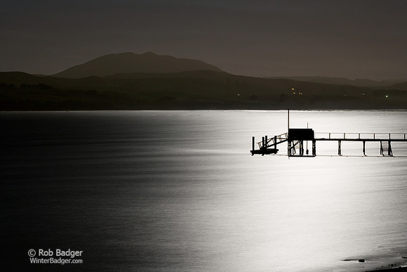 Black Mountain and Silhouette of dock against full moonlight reflected on Tomales Bay_Marin County_California_USA_S2P0481_Rob Badger